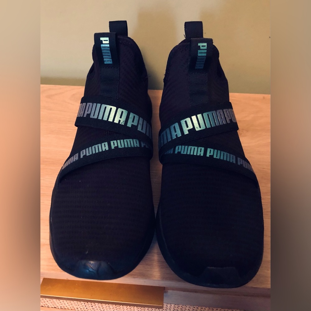 Women’s black puma sneakers